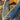 Close-up of a denim jacket with a blurred background