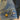 Close-up of a blue denim jacket with two buttons on a blurred background