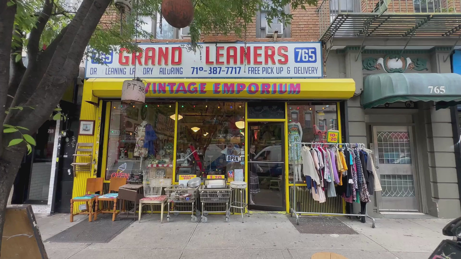 Video showing in front of Grand Leaners store with customers entering and exiting the shop