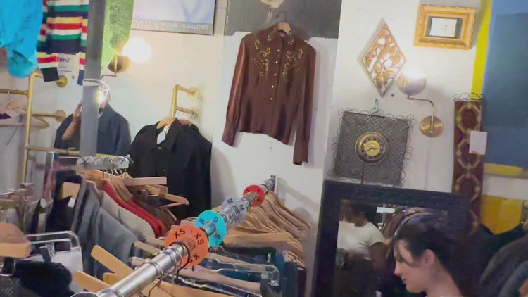 Video of people shopper inside of the Grand Leaners store